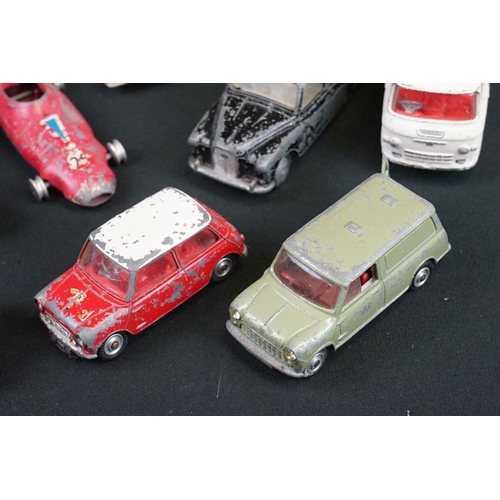 1187 - Around 32 mid 20th C play worn Corgi diecast models to include Ecurie Ecosse Racing Car Transporter ... 