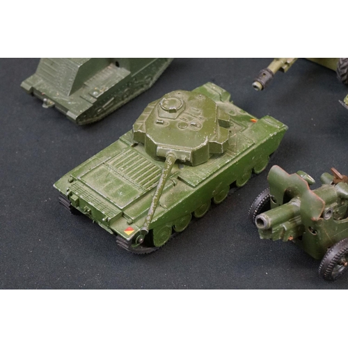 1188 - Around 19 mid 20th C play worn military diecast models & artillery to include Dinky & Britains examp... 