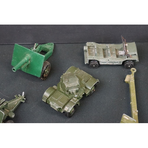 1188 - Around 19 mid 20th C play worn military diecast models & artillery to include Dinky & Britains examp... 