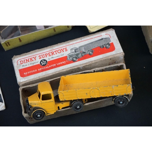 1190 - Three boxed Dinky diecast models to include 562 Dumper Truck in yellow, 521 Bedford Articulated Lorr... 