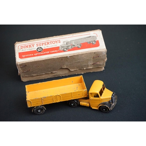 1190 - Three boxed Dinky diecast models to include 562 Dumper Truck in yellow, 521 Bedford Articulated Lorr... 