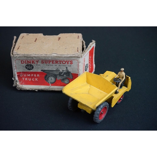 1190 - Three boxed Dinky diecast models to include 562 Dumper Truck in yellow, 521 Bedford Articulated Lorr... 