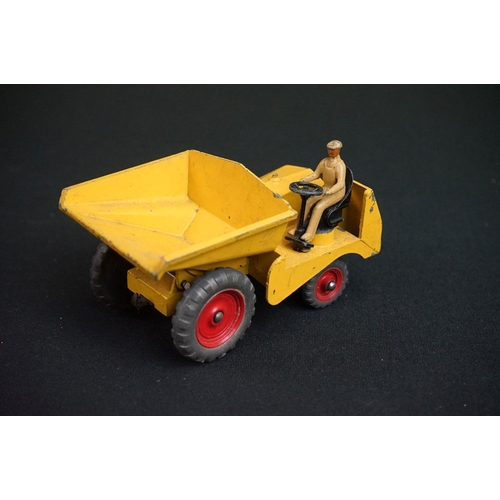 1190 - Three boxed Dinky diecast models to include 562 Dumper Truck in yellow, 521 Bedford Articulated Lorr... 