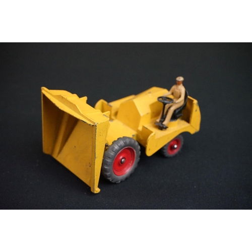 1190 - Three boxed Dinky diecast models to include 562 Dumper Truck in yellow, 521 Bedford Articulated Lorr... 