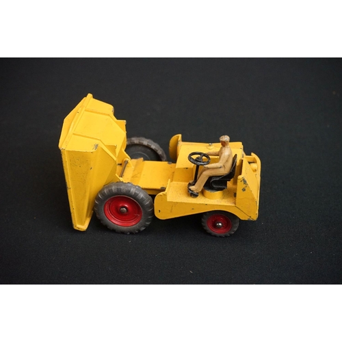 1190 - Three boxed Dinky diecast models to include 562 Dumper Truck in yellow, 521 Bedford Articulated Lorr... 