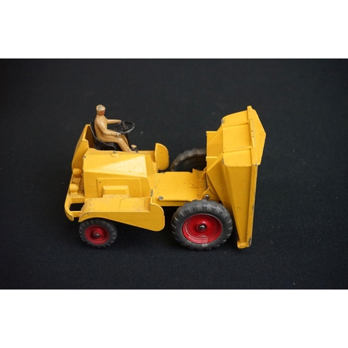 1190 - Three boxed Dinky diecast models to include 562 Dumper Truck in yellow, 521 Bedford Articulated Lorr... 