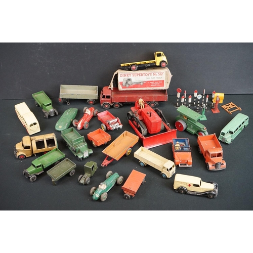 1205 - Around 22 mid 20th C Dinky diecast models to include Foden in maroon, Blaw Knox Bulldozer etc plus a... 