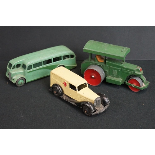 1205 - Around 22 mid 20th C Dinky diecast models to include Foden in maroon, Blaw Knox Bulldozer etc plus a... 