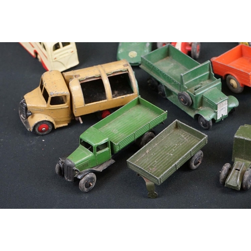 1205 - Around 22 mid 20th C Dinky diecast models to include Foden in maroon, Blaw Knox Bulldozer etc plus a... 