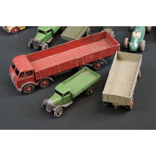 1205 - Around 22 mid 20th C Dinky diecast models to include Foden in maroon, Blaw Knox Bulldozer etc plus a... 