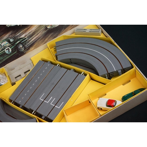 1208 - Collection of Triang Minic Motorways to include boxed M1522 set, 2 x boxed slot cars featuring Aston... 