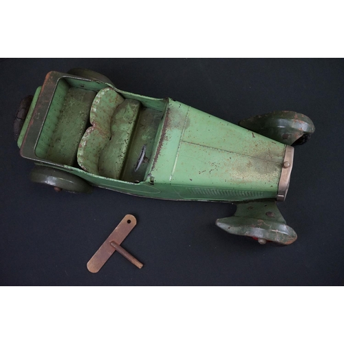 1279A - Early to mid 20th C 1936 Ford model car in green, construction built, clockwork with key, approx. le... 