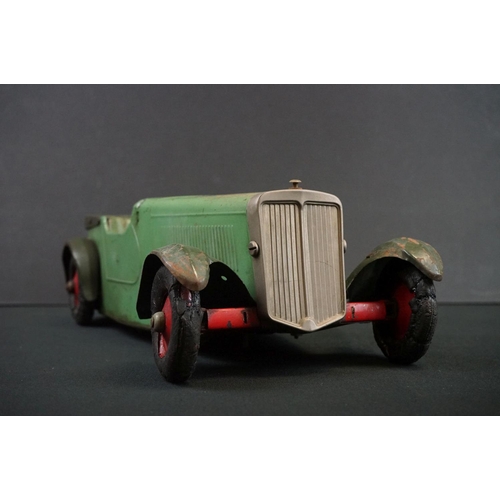 1279A - Early to mid 20th C 1936 Ford model car in green, construction built, clockwork with key, approx. le... 