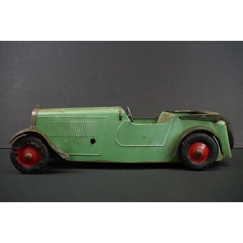 1279A - Early to mid 20th C 1936 Ford model car in green, construction built, clockwork with key, approx. le... 