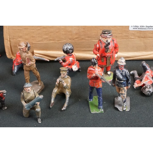 1296 - Collection of mid 20th C metal figures & accessories to include various military examples and farmin... 