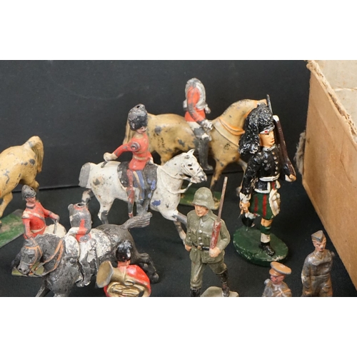 1296 - Collection of mid 20th C metal figures & accessories to include various military examples and farmin... 