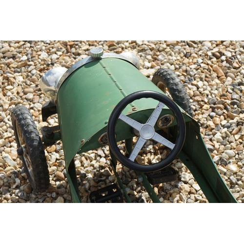 1171 - Vintage tin plate pedal car with 1939 registration, unmarked, green body with black seat, approx len... 