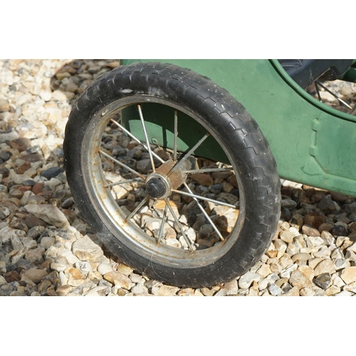 1171 - Vintage tin plate pedal car with 1939 registration, unmarked, green body with black seat, approx len... 