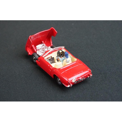 1215 - Boxed Dinky 114 Triumph Spitfire diecast model in red with driver (paint chips, box squash) plus a D... 