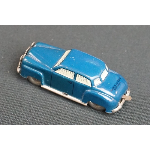 1218 - Boxed Liliput Auto The Mighty Midget tin plate model car in blue, model gd with a few scratches, box... 