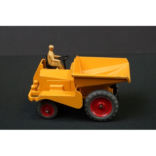 1222 - Three boxed Dinky Supertoys diecast models to include 562 Dumper Truck in yellow, 961 Blaw-Knox Bull... 