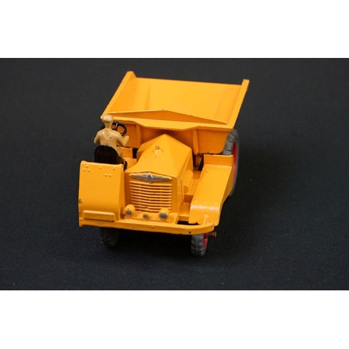 1222 - Three boxed Dinky Supertoys diecast models to include 562 Dumper Truck in yellow, 961 Blaw-Knox Bull... 