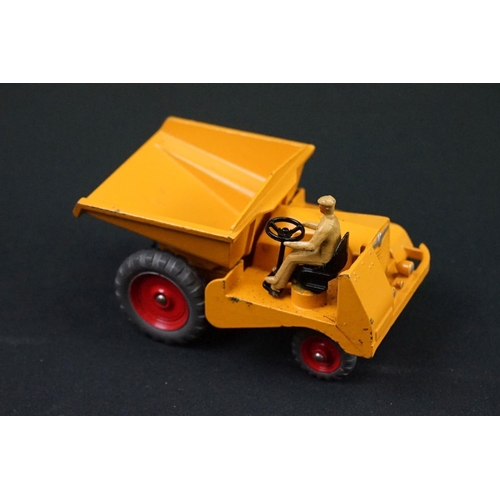 1222 - Three boxed Dinky Supertoys diecast models to include 562 Dumper Truck in yellow, 961 Blaw-Knox Bull... 