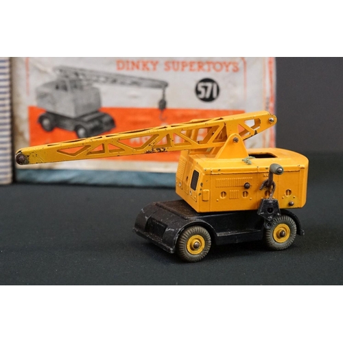 1222 - Three boxed Dinky Supertoys diecast models to include 562 Dumper Truck in yellow, 961 Blaw-Knox Bull... 