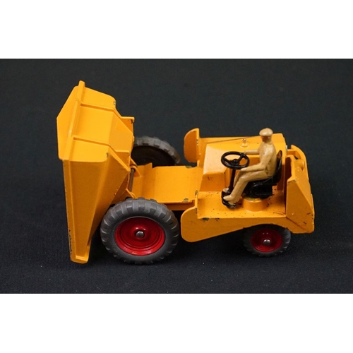 1222 - Three boxed Dinky Supertoys diecast models to include 562 Dumper Truck in yellow, 961 Blaw-Knox Bull... 