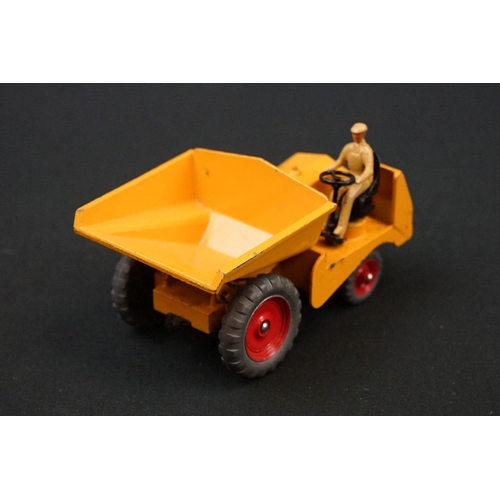 1222 - Three boxed Dinky Supertoys diecast models to include 562 Dumper Truck in yellow, 961 Blaw-Knox Bull... 