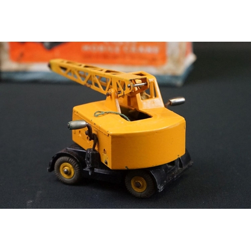 1222 - Three boxed Dinky Supertoys diecast models to include 562 Dumper Truck in yellow, 961 Blaw-Knox Bull... 