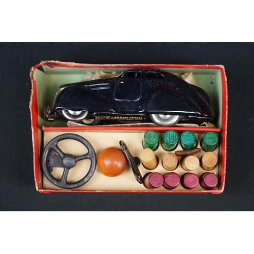 1225 - Two boxed Schuco clockwork tin plate cars to include Telesteering Car 3000 in black complete with al... 