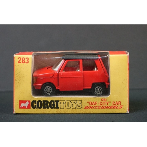 1230 - Three boxed Corgi diecast models to include 341 Mini Marcos GT 850 in metallic red, Whizzwheels 283 ... 