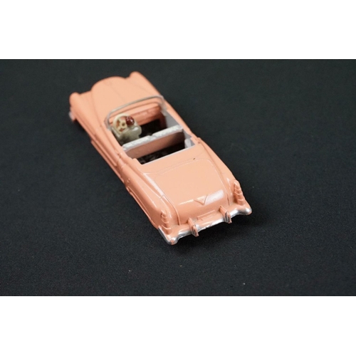 1233 - Two Boxed Dinky diecast models to include 131 Cadillac Eldorado Tourer in salmon pink (with driver, ... 