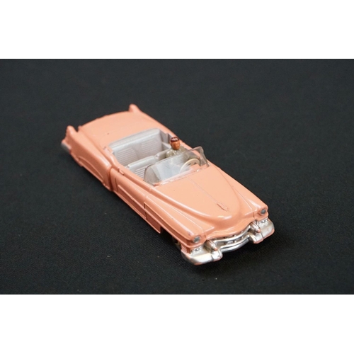 1233 - Two Boxed Dinky diecast models to include 131 Cadillac Eldorado Tourer in salmon pink (with driver, ... 