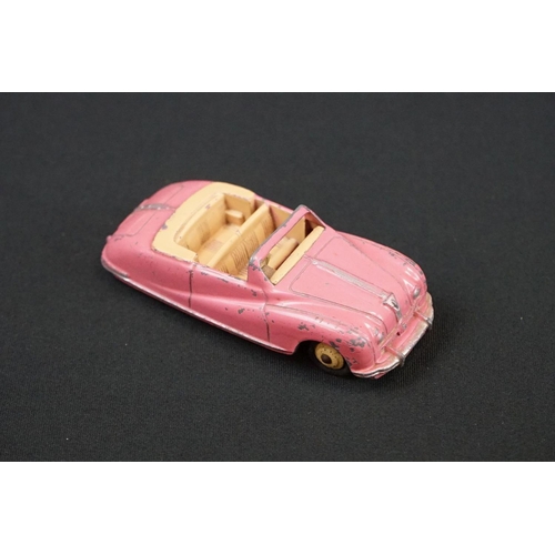 1233 - Two Boxed Dinky diecast models to include 131 Cadillac Eldorado Tourer in salmon pink (with driver, ... 