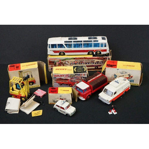 1251 - Five Boxed Dinky diecast models to include 952 Vega Major Luxury Coach in white, 402 Bedford Coca-Co... 