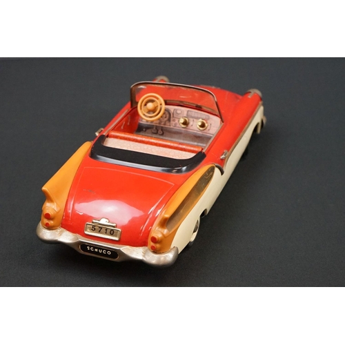 1252 - Schuco Elektro Radio 5710 tinplate model in two tone red and white, brown fins, small hole to windsc... 