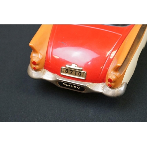 1252 - Schuco Elektro Radio 5710 tinplate model in two tone red and white, brown fins, small hole to windsc... 