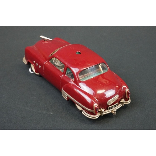 1254 - Three Schuco Ingenico tinplate clockwork cars to include 2 x 5380 (1 x blue & 1 x burgundy) and 5325... 