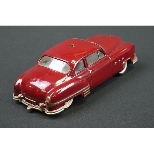 1254 - Three Schuco Ingenico tinplate clockwork cars to include 2 x 5380 (1 x blue & 1 x burgundy) and 5325... 