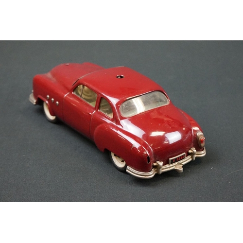 1254 - Three Schuco Ingenico tinplate clockwork cars to include 2 x 5380 (1 x blue & 1 x burgundy) and 5325... 