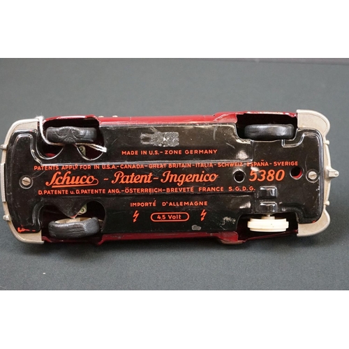 1254 - Three Schuco Ingenico tinplate clockwork cars to include 2 x 5380 (1 x blue & 1 x burgundy) and 5325... 