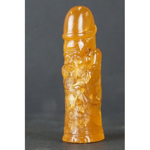 308 - A carved amber Japanese Netsuke pendant in the form of a phallus