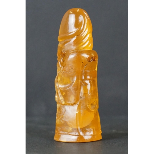 308 - A carved amber Japanese Netsuke pendant in the form of a phallus