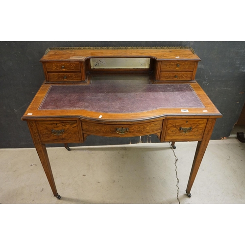 569 - Edwardian Rosewood Inlaid Ladies Writing Desk, the superstructure with gilt-metal three quarter gall... 