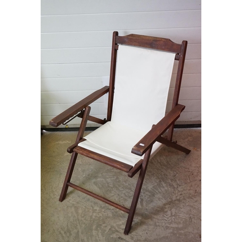 634 - Pair of Hardwood Folding Steamer Chairs with detachable foot rests and new cream canvas seats