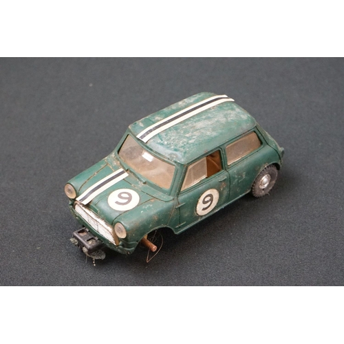 1245 - Five Triang Scalextric slot cars to include 2 x Austin Mini Cooper in green (missing a wheel) and re... 