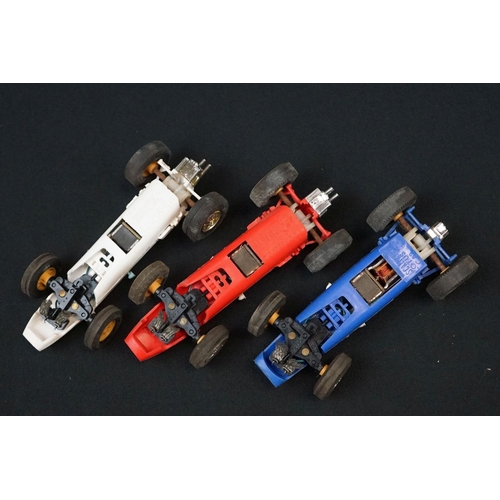 1245 - Five Triang Scalextric slot cars to include 2 x Austin Mini Cooper in green (missing a wheel) and re... 