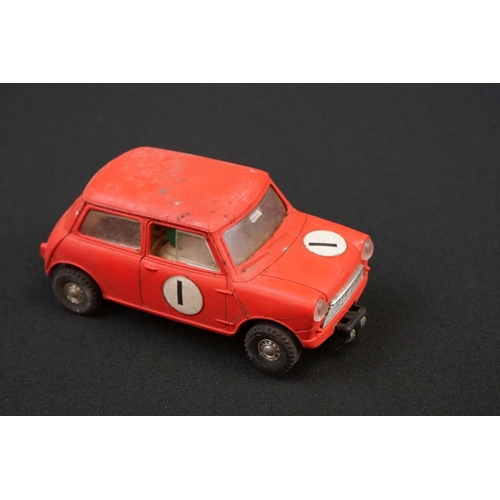 1245 - Five Triang Scalextric slot cars to include 2 x Austin Mini Cooper in green (missing a wheel) and re... 